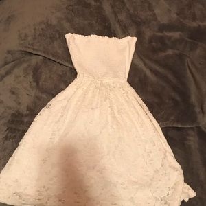 A strapless white sun dress.